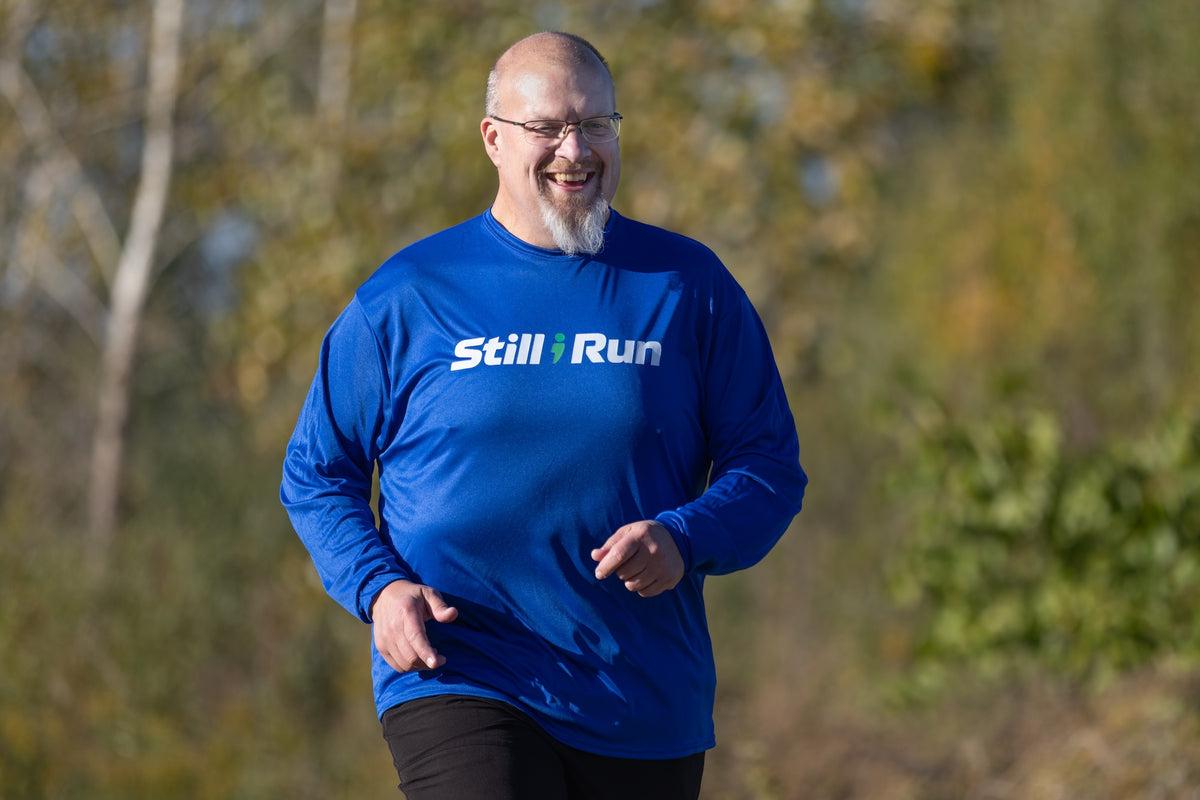 Still I Run Unisex Long Sleeve Performance Tee