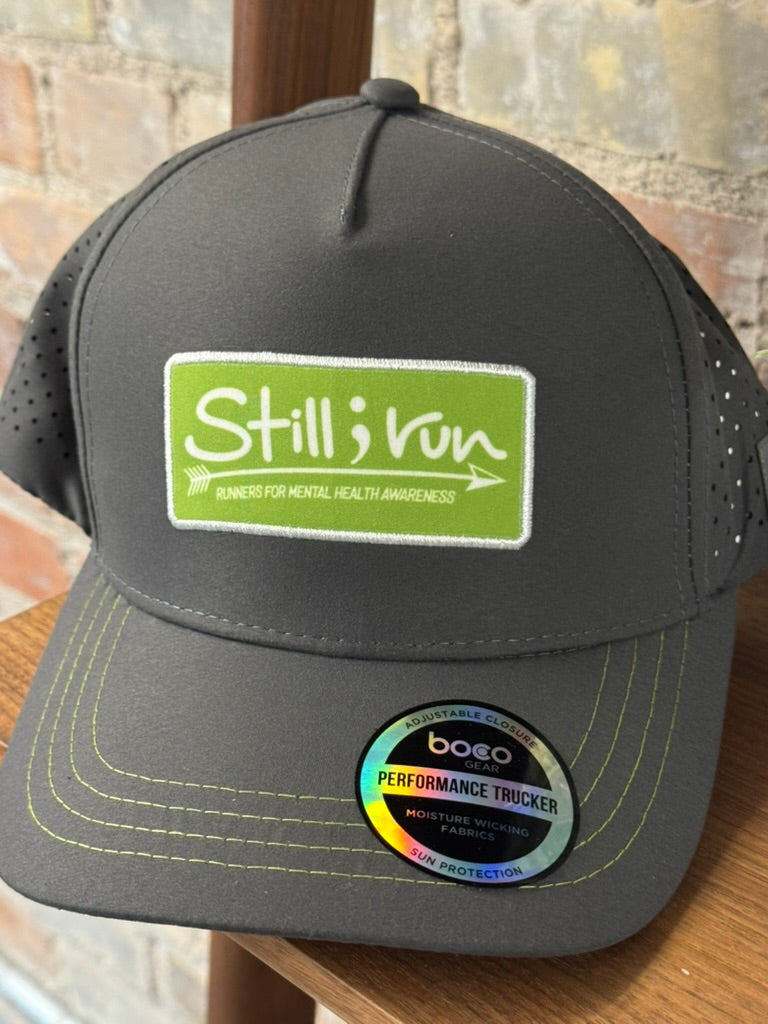 Still I Run Green Patch Trucker