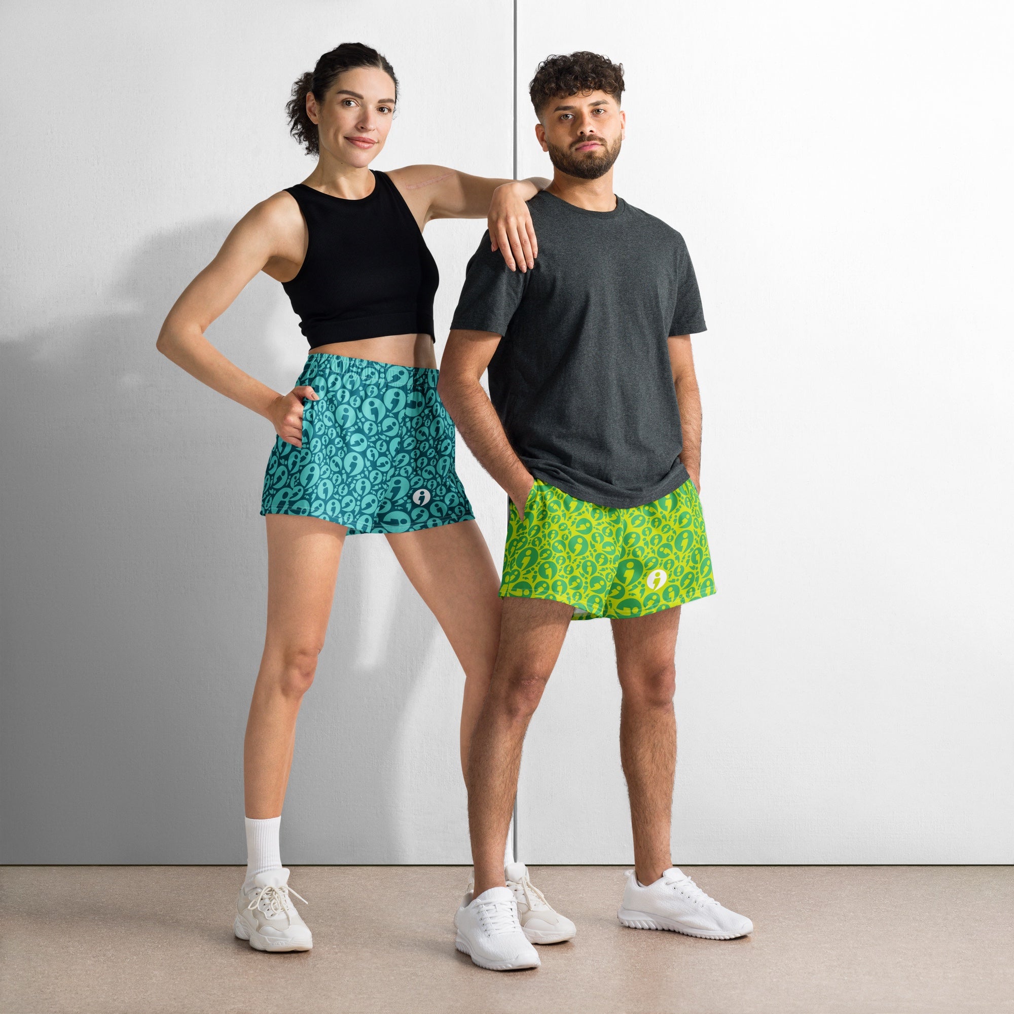 Two people standing wearing the Movement Collections 2.53" inseam athletic shorts.