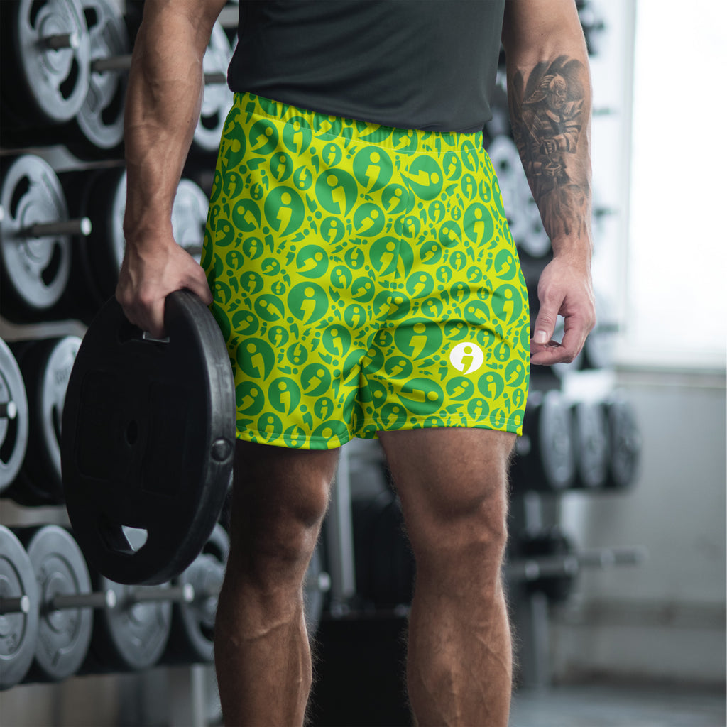 Man wearing The Movement Collection's green 6.3" inseam athletic shorts