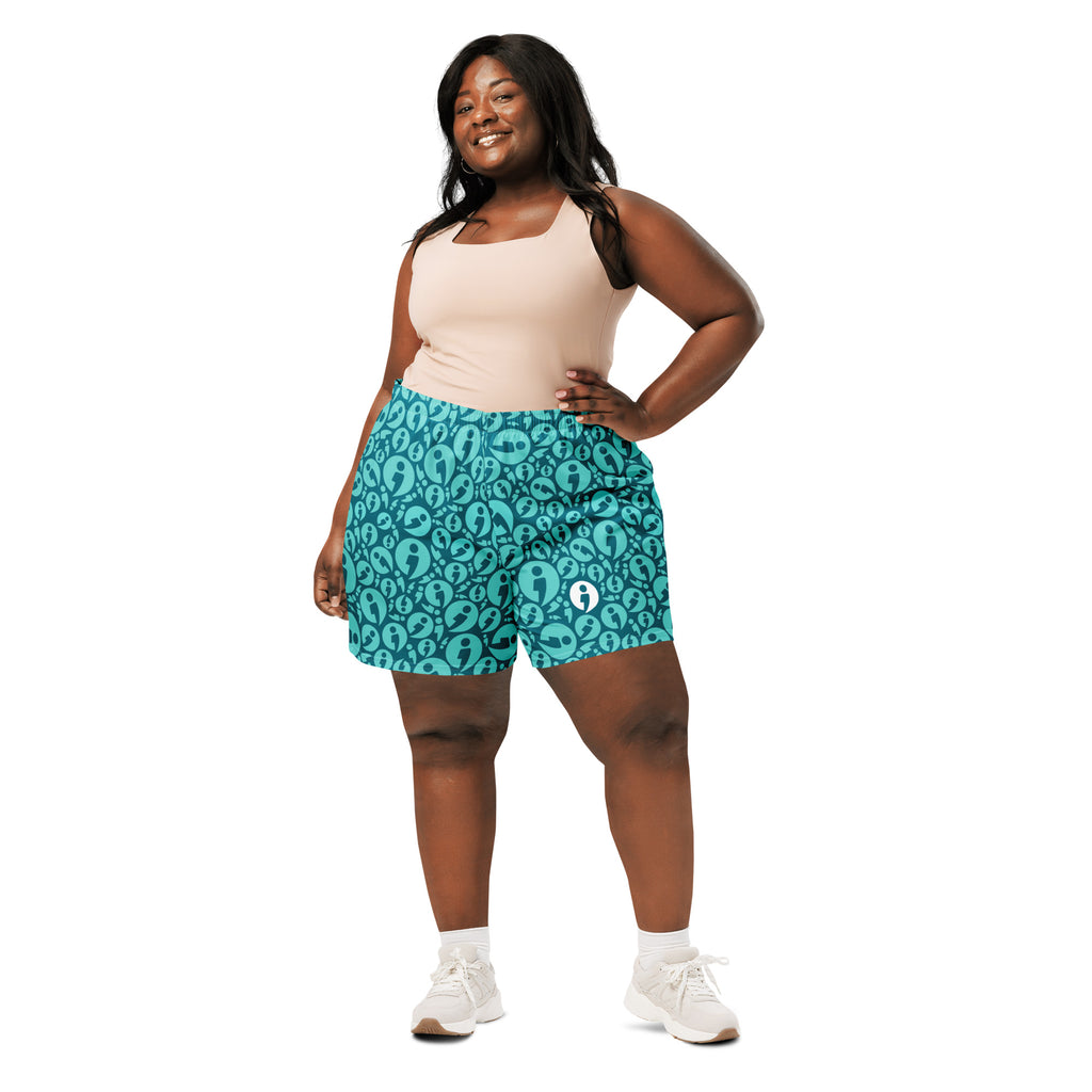 Woman wearing The Movement Collection teal 6.3" inseam athletic shorts