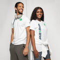 Two people standing angled back to back wearing The Movement Collection's unisex tee.